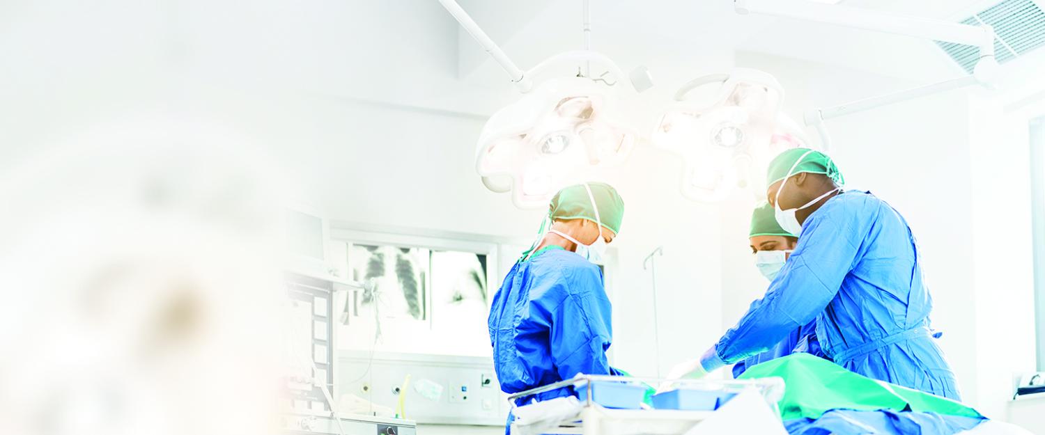 Three surgeons in OR